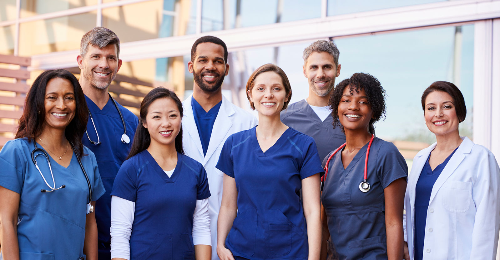 Nurses standing outside a clinic