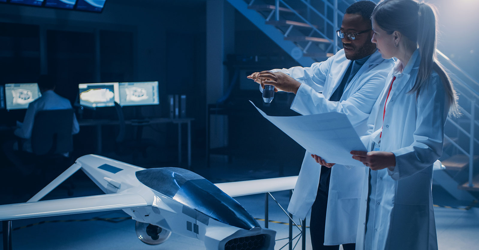 A group of engineers in a lab