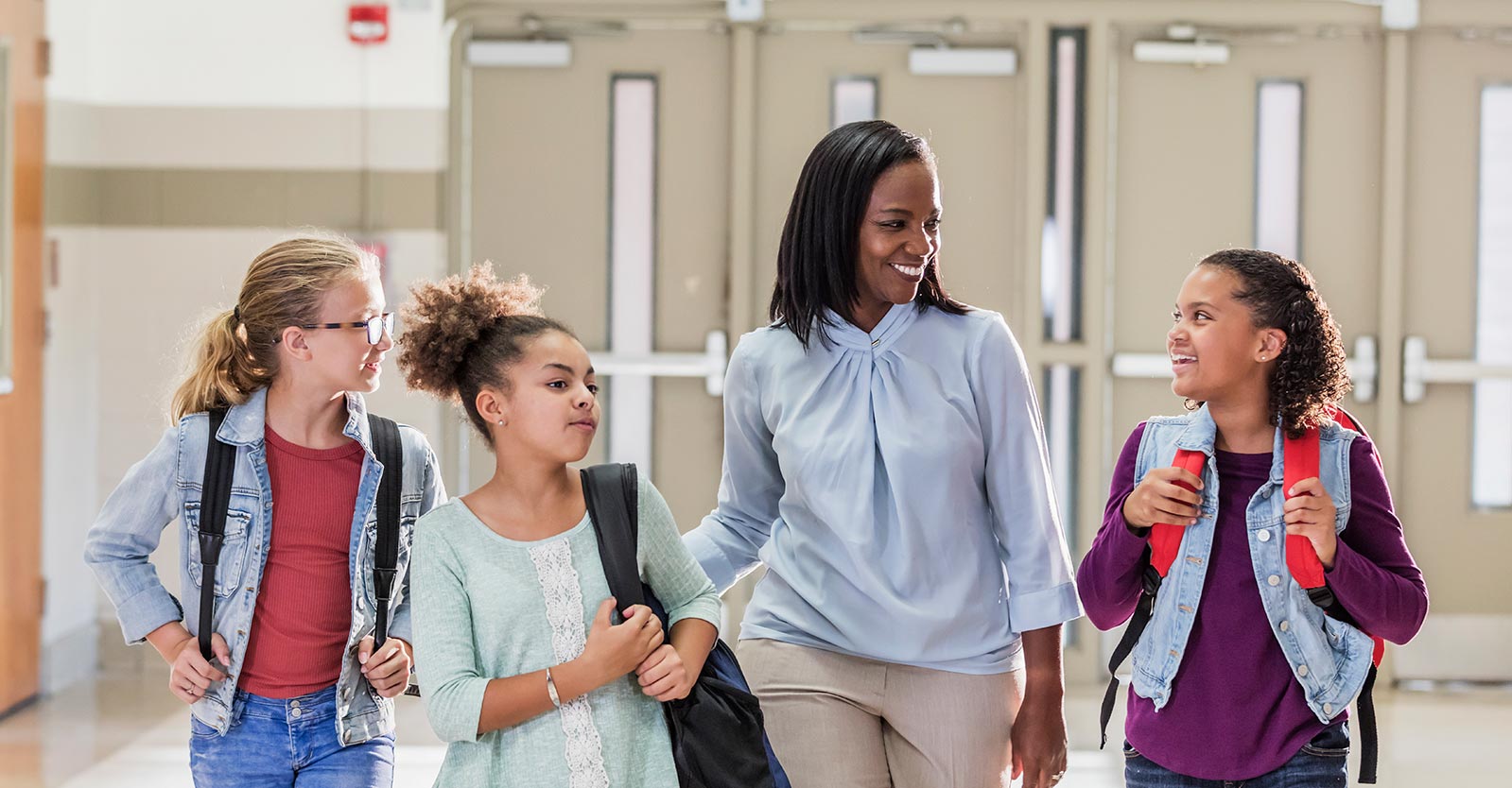 Teacher walking with students