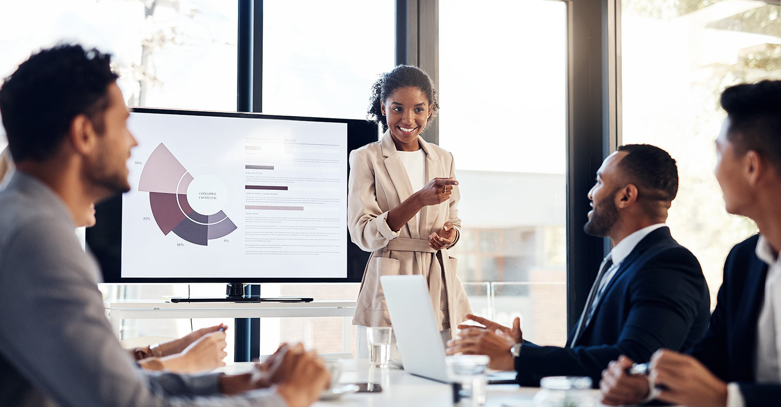 Woman presenting during a meeting