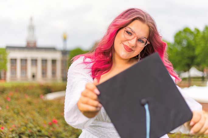 Hannah Homan with graduate cap