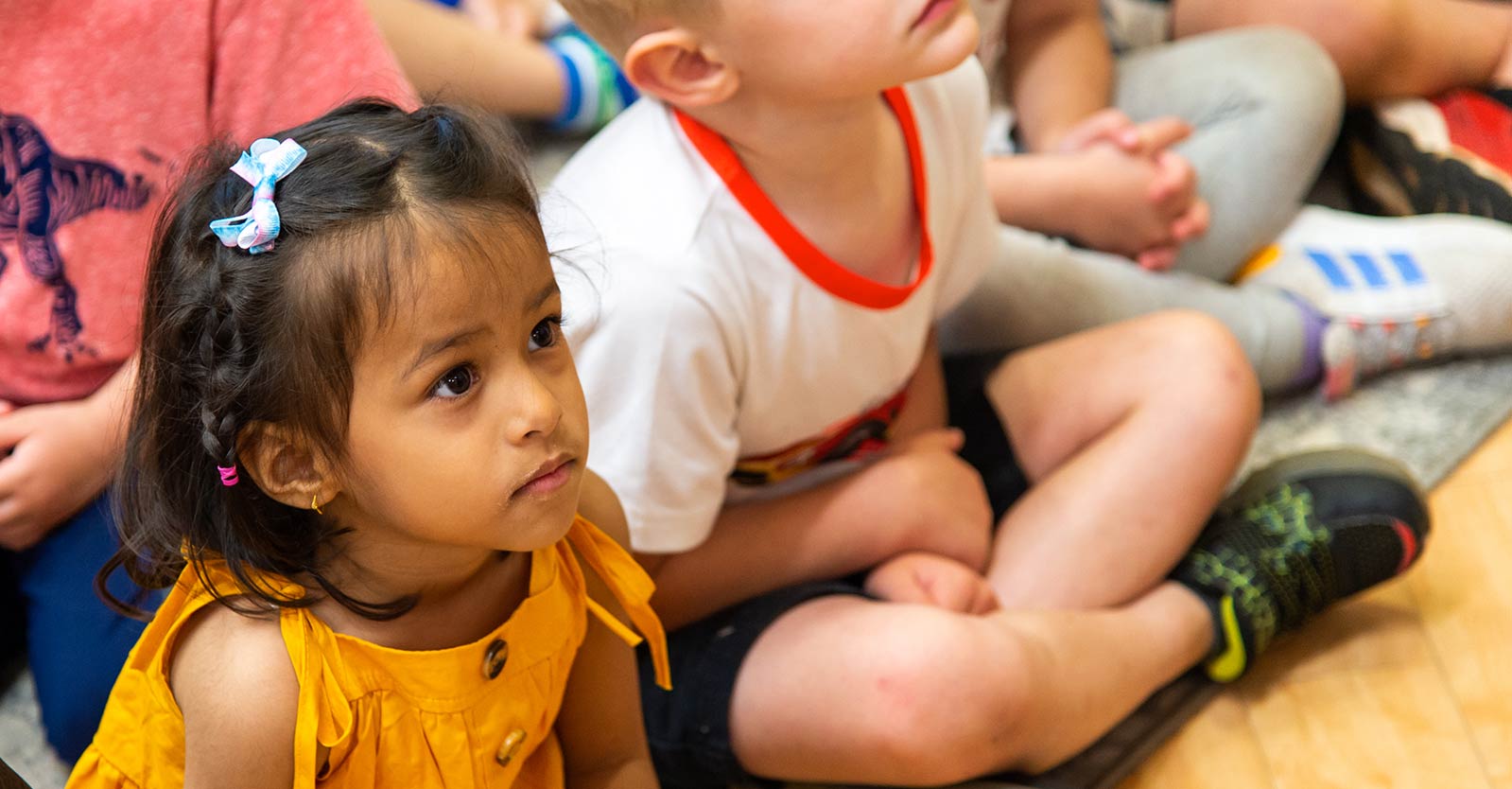 Children listening to a speaker