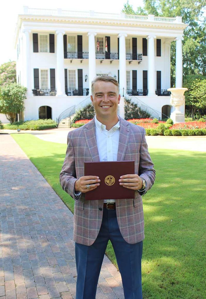 Ryan Jacobs outside the president's mansion at The University of Alabama