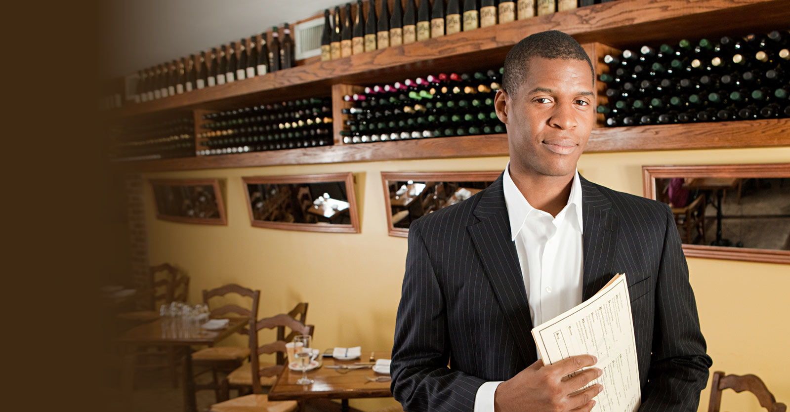 Man standing inside a restaurant