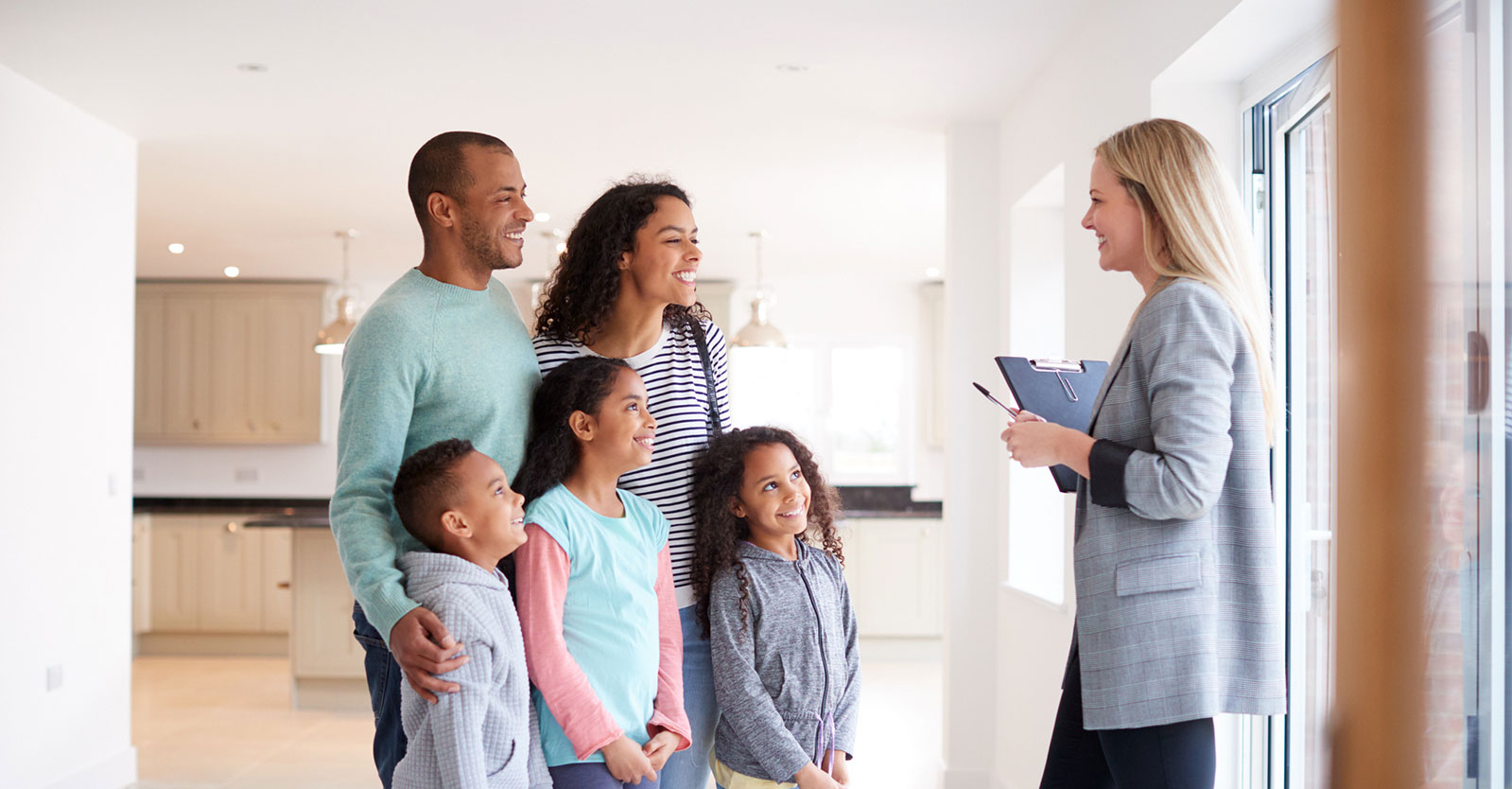 Woman talking to a family