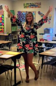 Hannah Jackson standing in an empty elementary classroom