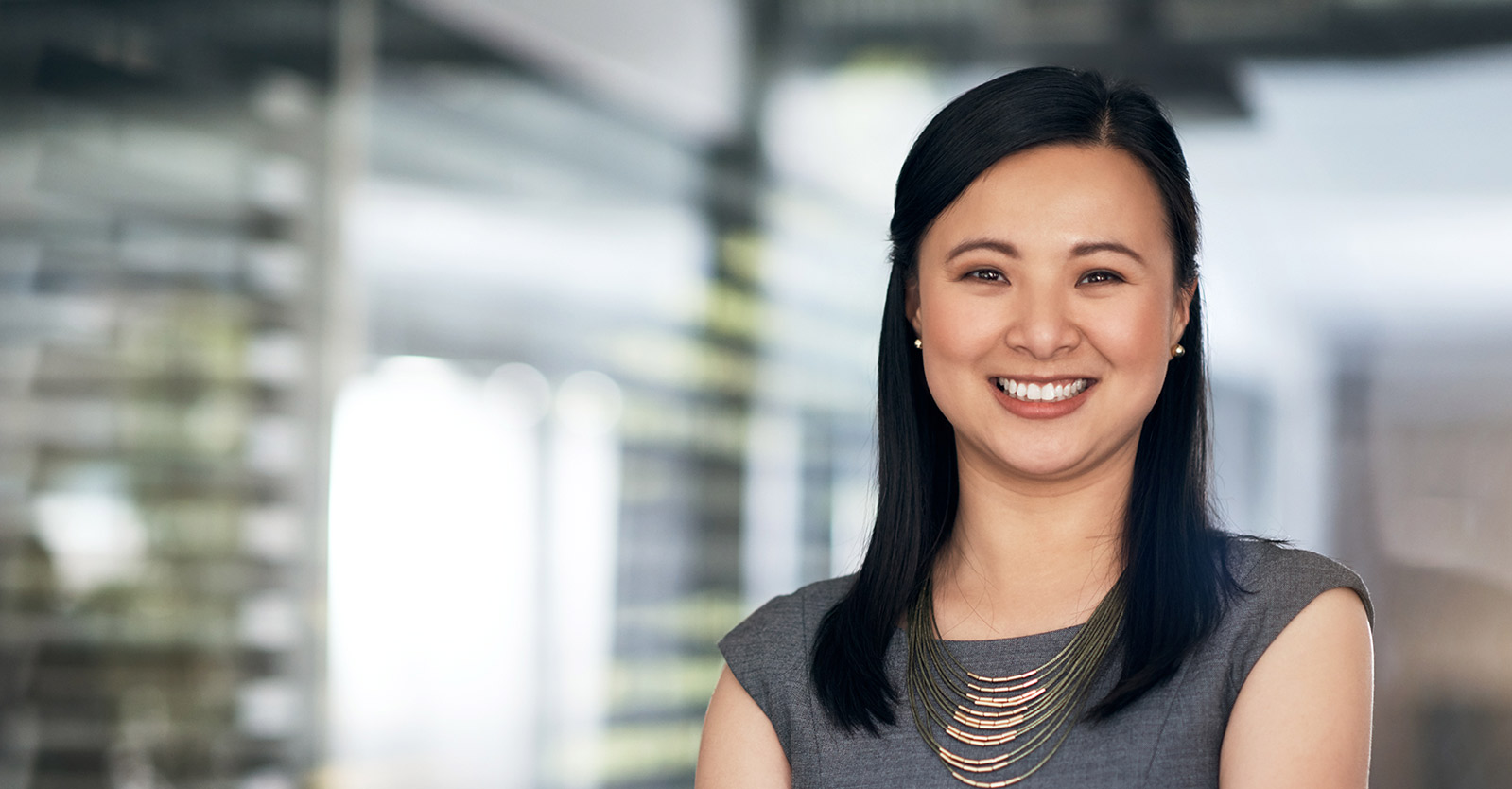 Woman standing inside a conference room