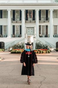 Megan Welborn in front of the president's mansion.