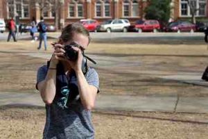 Dani Sagirs holding a camera